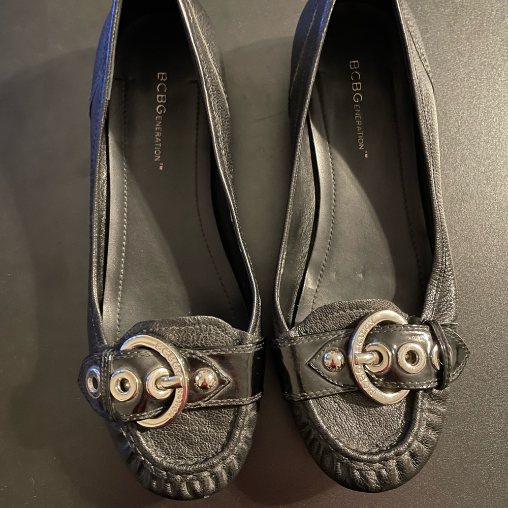 BCBGeneration Black Leather Flats with Silver Buckle